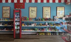 The back wall has a wide selection of sweet treats and drinks