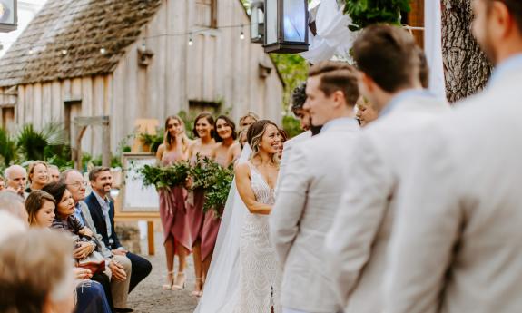 Focused on the bride during the ceremony at Colonial Oak Music Park & Venue