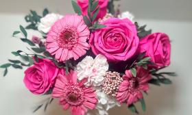 Bright pink flowers delicately arranged