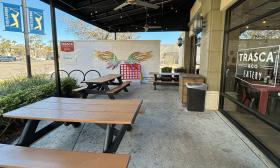 Outdoor patio seating and games for customers to play with
