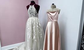 Mannequins showcasing a wedding and formal dress