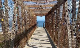 The lock bridge that leads to the beach