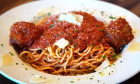A bowl of spaghetti and meatballs served at Bronx
