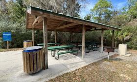 A covered picnic pavilion with a grill is onsite