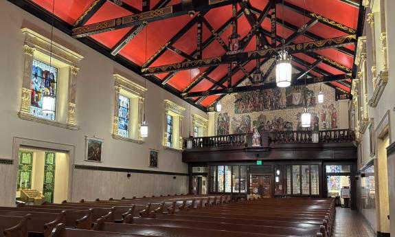 The back side of the nave and the pews where visitors can congregate