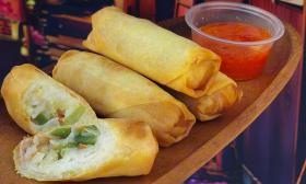 Vegetable spring rolls with sweet chili sauce on the side