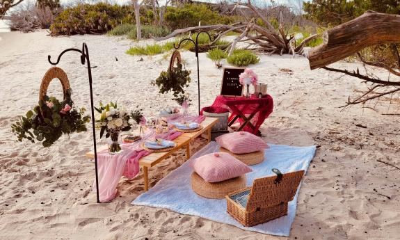 Saint Augustine Picnic and Proposals offers various packages like this sunset picnic setup