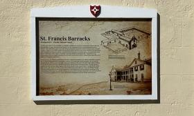 An informational sign visitors can read about the barracks