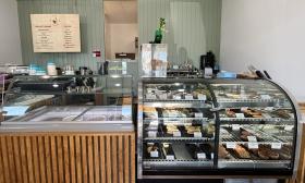 Desserts, ice cream, and the menu is on display inside the shop