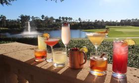 A variety of cocktails overlooking the fountain at TPC Sawgrass