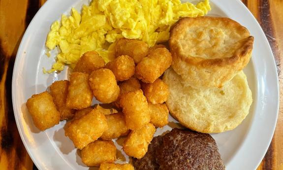 An egg, sausage, and tater tots breakast from Auggie's Draft Room