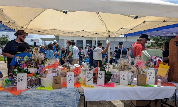 The prize table full of baskets and an assortment of knick-knacks