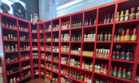 A collection of hot suaces inside the store