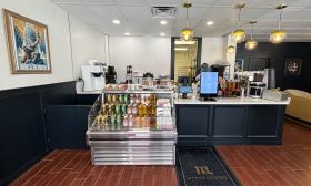 The counter area where customers can order and grab a cold beverage