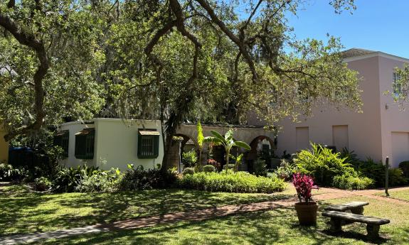 A garden sits in the back of the Oldest House used for events and lounging