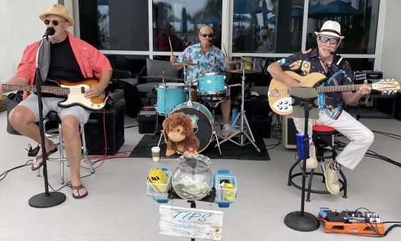 The band playing live at a venue