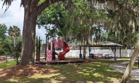 The playground onsite is shaded with trees