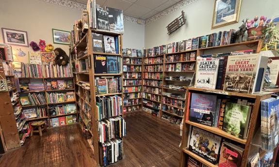 A collection of books on the back side of Second Read