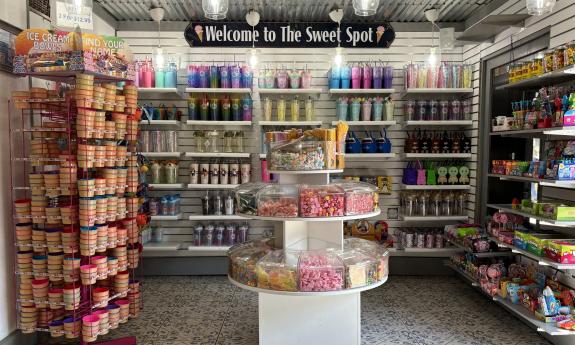 Snacks, treats, and other merchandise are on display