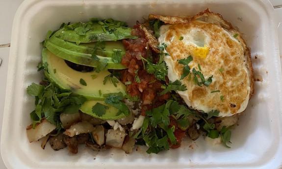 A to go box of carne asada hash