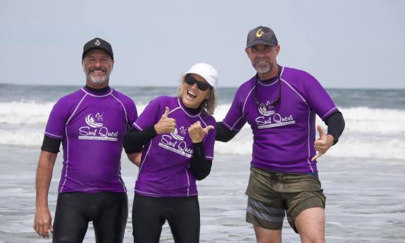 Instructors for SurfQuest posing at Crescent Beach