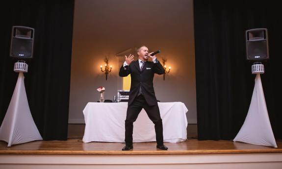 Jeff Bell onstage getting the crowd excited