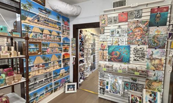 Artwork arranged on the walls in-store