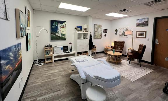The hydrafacial chair in a separate room