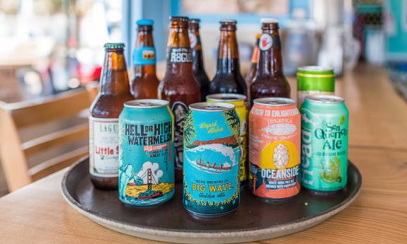 Bottled and canned beers placed on a tray