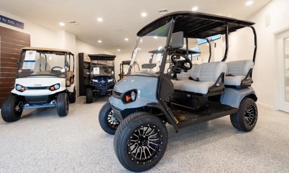 High quality golf carts parked in the showroom