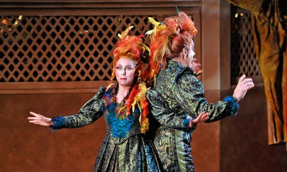 Two principals in the Magic Flute, with bright red hair and colorfull costumes