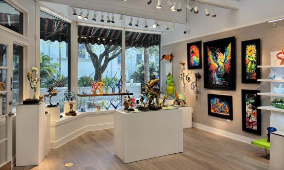 Artwork and bronze sculptures near the gallery's front windows