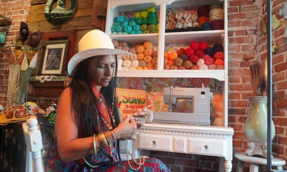 Mirian Hahn crocheting an item