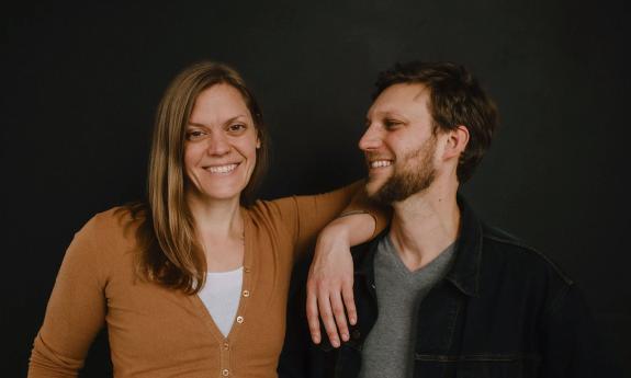 Rough & Tumble band standing together, smiling