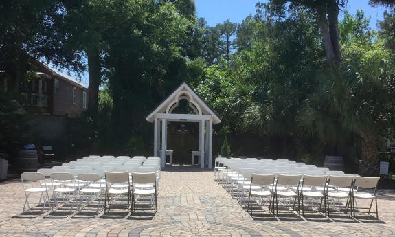 The Commons on St. Cyprians with chairs arranged for a concert
