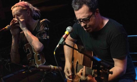 JJ Appleton and Jason Ricci perform live on stage.