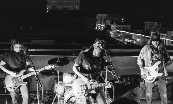 Lightwatch band playing a gig, outside