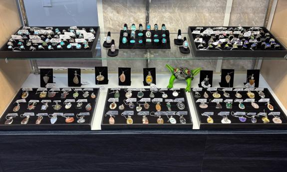 Various rings and pendants presented