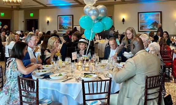 Guests gathered at a decorated table