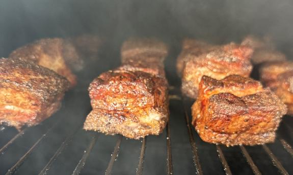 Pork belly burnt ends on the grill