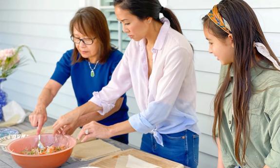 The Ha family cooking together