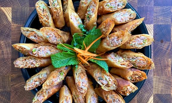 Imperial rolls with a garnish in the middle