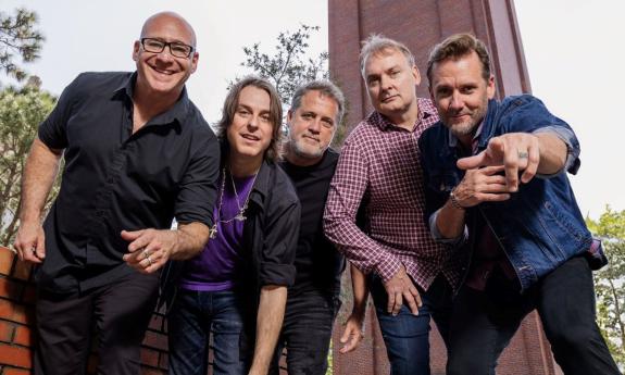 Bandmates from Sister Hazel pose outdoors. 