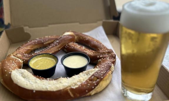 A Bavarian pretzel with a Dog Rose beer