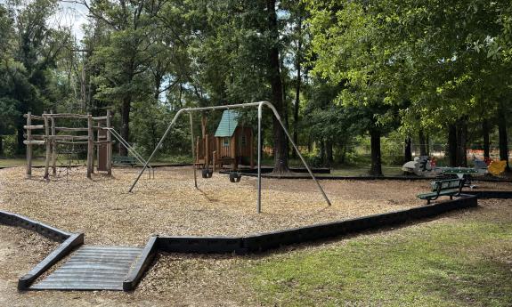 A playground set with various activities