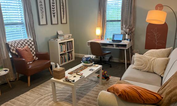 A cozy room used for Phases of Healing Therapy clients