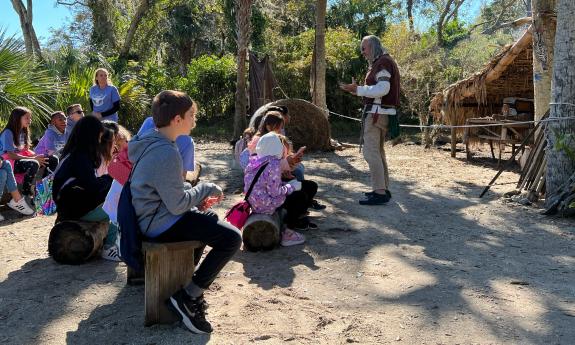 School children listen to a presenter at the Fountain of Youth