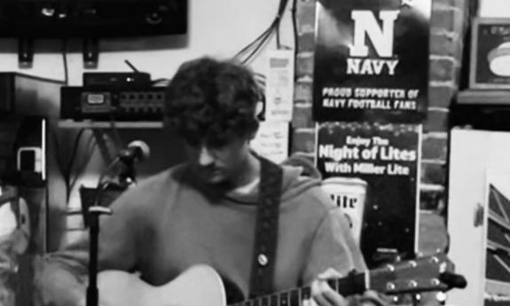Guitarist Hudson Vance with his instrument