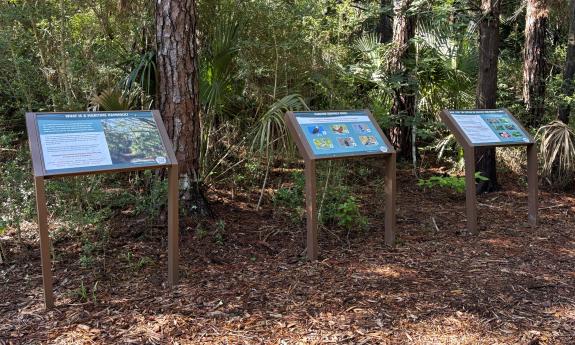 Informational displays placed along the trails