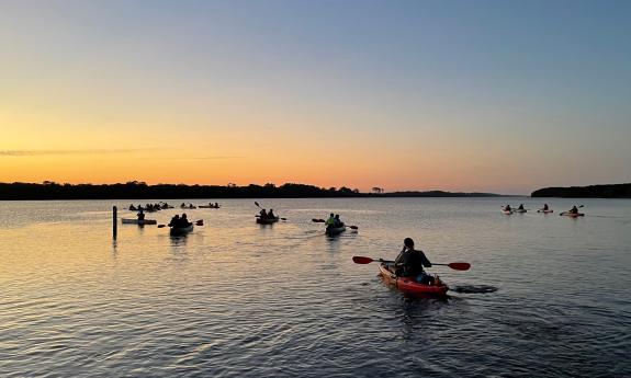 Kayaks on a Florida lake at sunset